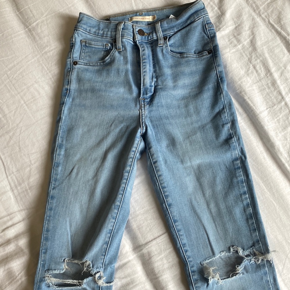 Levi’s mile high super skinny distressed jeans